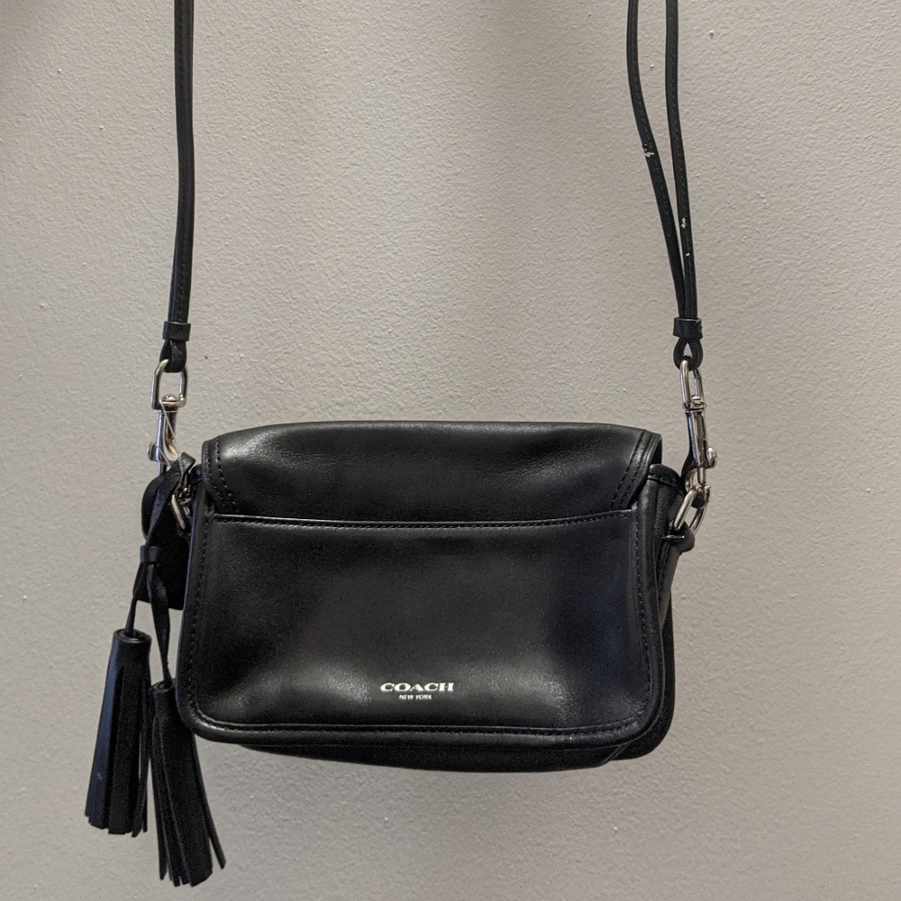 Small Black Coach Handbag with extended shoulder strap